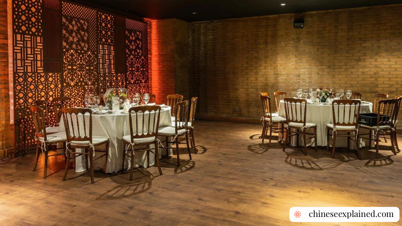 Shared dishes at a Chinese round-table meal show how dining etiquette is practiced in real social settings.